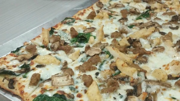 Their newest menu options include their Cali Alfredo pizza (creamy Alfredo sauce and whole milk mozzarella with fresh spinach, Italian sausage grilled chicken breast and fresh mushrooms), BBQ Chicken pizza (with a smoky BBQ sauce, grilled chicken, red onions and topped with fried onions) new and improved wings (bone-in buffalo wings or boneless oven-baked, all-white-meat nuggets in sweet chili sauce, smoky BBQ sauce or hot buffalo wing sauce.)