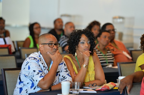 Couples listen intently during the "How to Establish Financial Intimacy” panel discussion sponsored by Wells Fargo at the kickoff session of the 3rd Annual BMWK Marriage Cruise in Fort Lauderdale, FL on July 29, 2017.